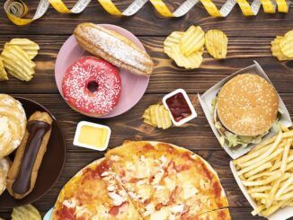 fast food pizza hamburger cibi da evitare con il colesterolo alto